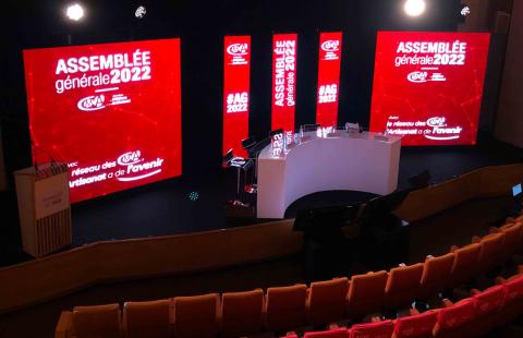 Organisation assemblée générale annuelle dans un auditorium