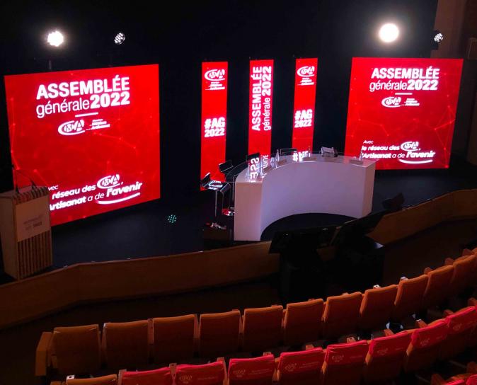 Organisation assemblée générale annuelle dans un auditorium